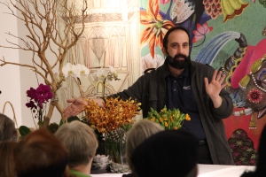 Tom is demonstrating different floral varieties and how we use them at Starbright Floral Design.