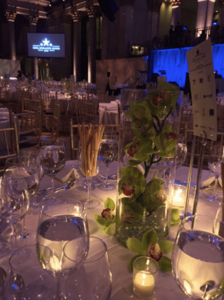 Starbright’s elegant orchids were highlighted with delicate tea lights on each table.